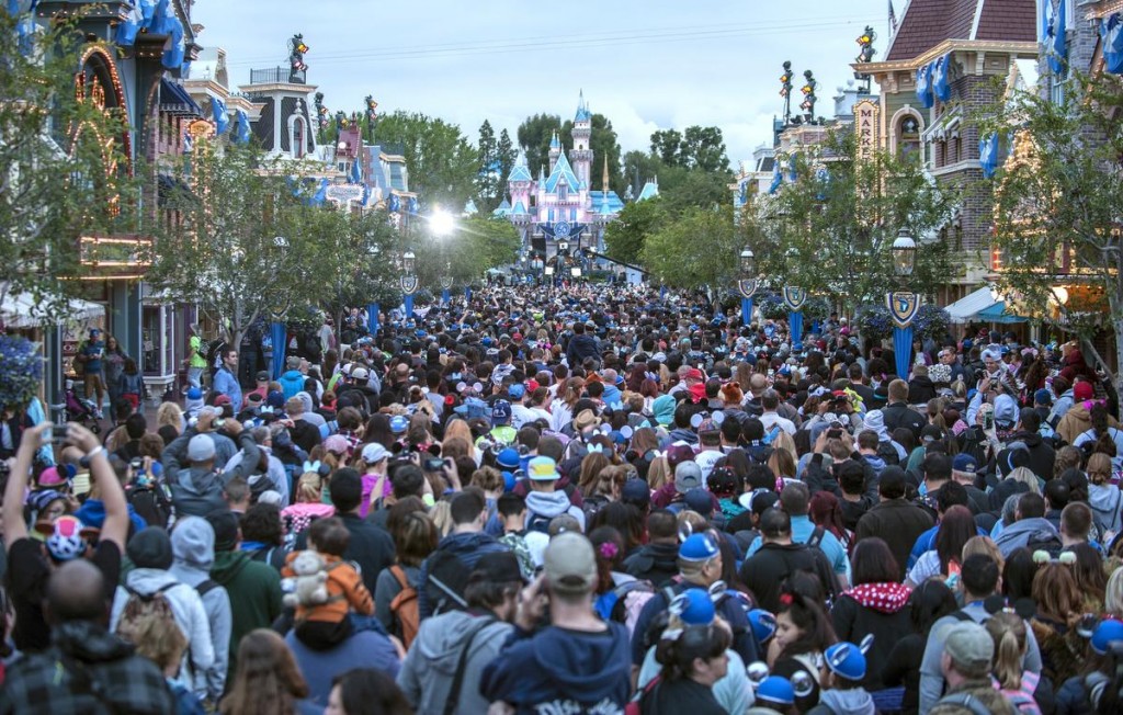 Thousands crowd on Main Street USA at Disneyland in Anaheim Friday morning as it celebrates its 60th anniversary with a 24-hour party that began at 6am. ///ADDITIONAL INFORMATION: disney24hour – 05/22/15 – MARK RIGHTMIRE, THE ORANGE COUNTY REGISTER